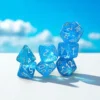 Kości Chessex - zestaw 7 kostek Luminary Mega-hedral Sky/Silver Luminary (świecące w ciemnościach)